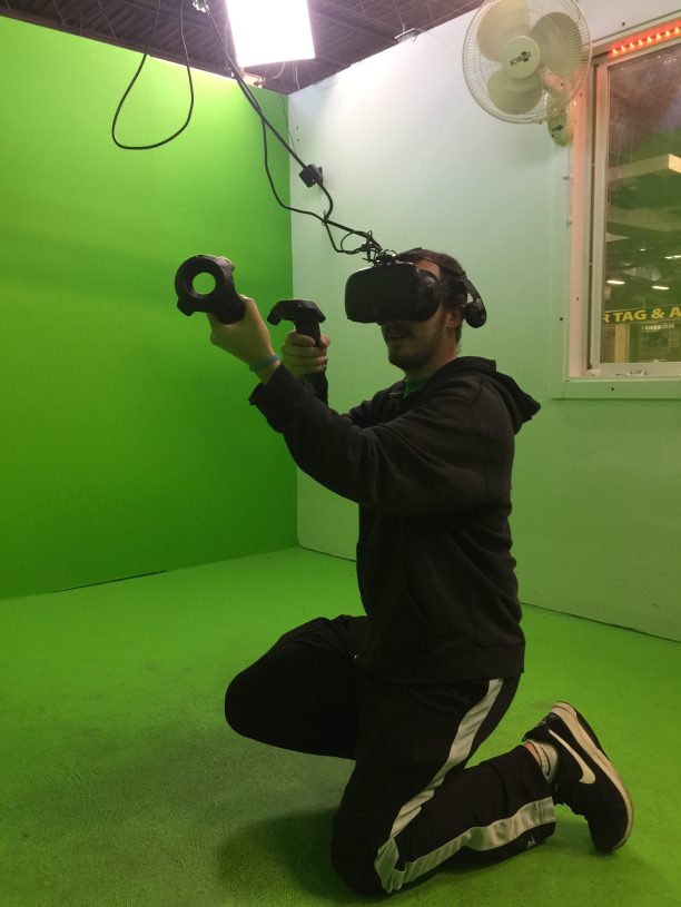 Indoor Virtual Reality (VR) Arcade at American Paintball Coliseum in Denver Man playing virtual reality at our Denver Indoor VR Arcade